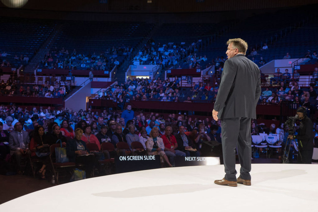 Photo of Presley Swagerty speaking to large audience
